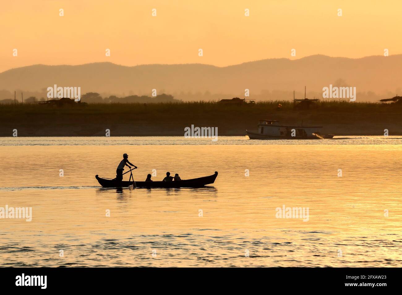 Sunrise on the Irrawaddy River (Ayeyarwaddy River) in Myanmar (Burma). It is the country's