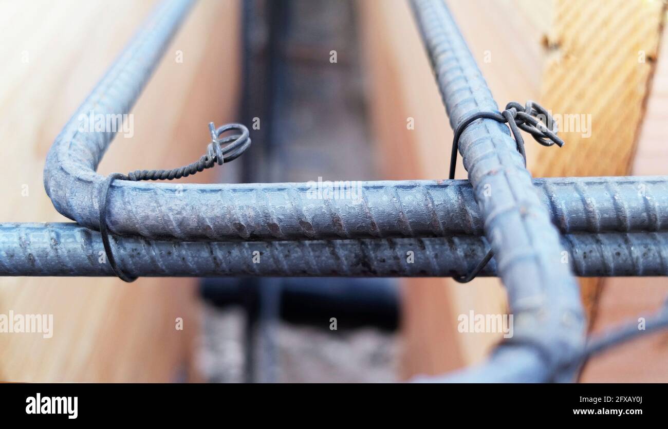 Steel anchor rebar rods in trench footing frame Stock Photo