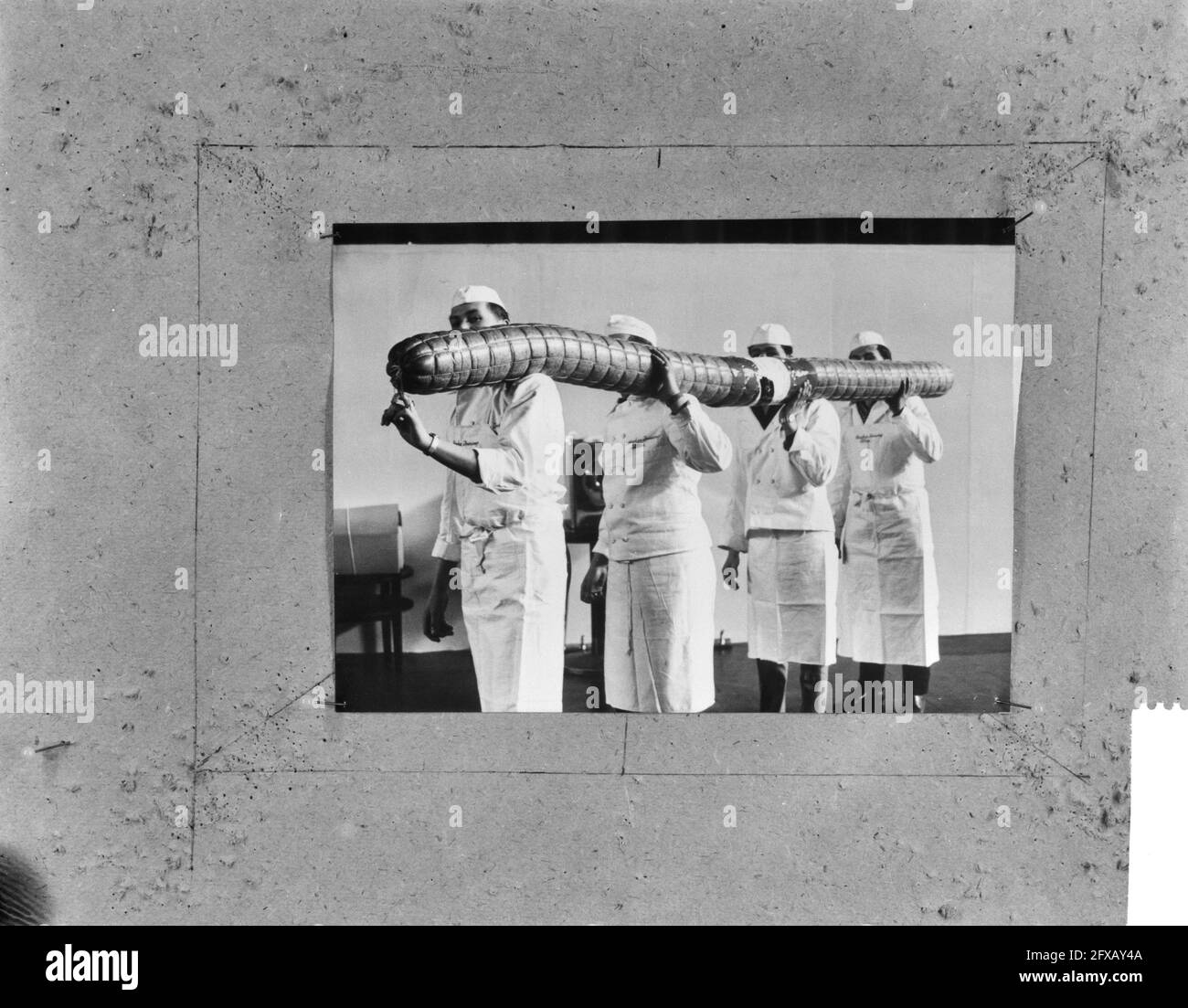 A sausage 4 feet long, April 6, 1964, sausages, The Netherlands, 20th century press agency photo, news to remember, documentary, historic photography 1945-1990, visual stories, human history of the Twentieth Century, capturing moments in time Stock Photo