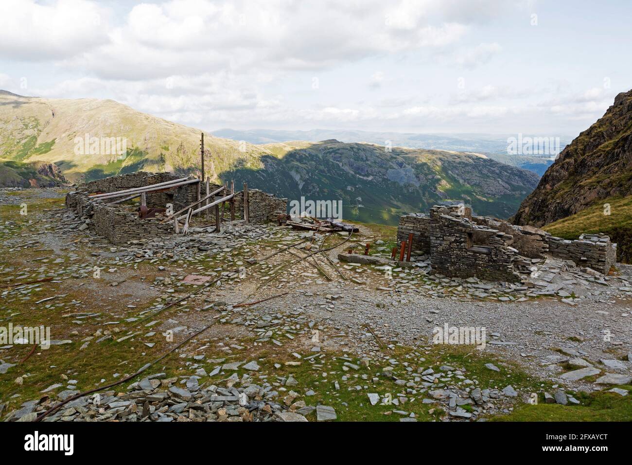 A ruined building that was once a hub for slate mining on the Old Man of Coniston in Cumbria, England. Stock Photo