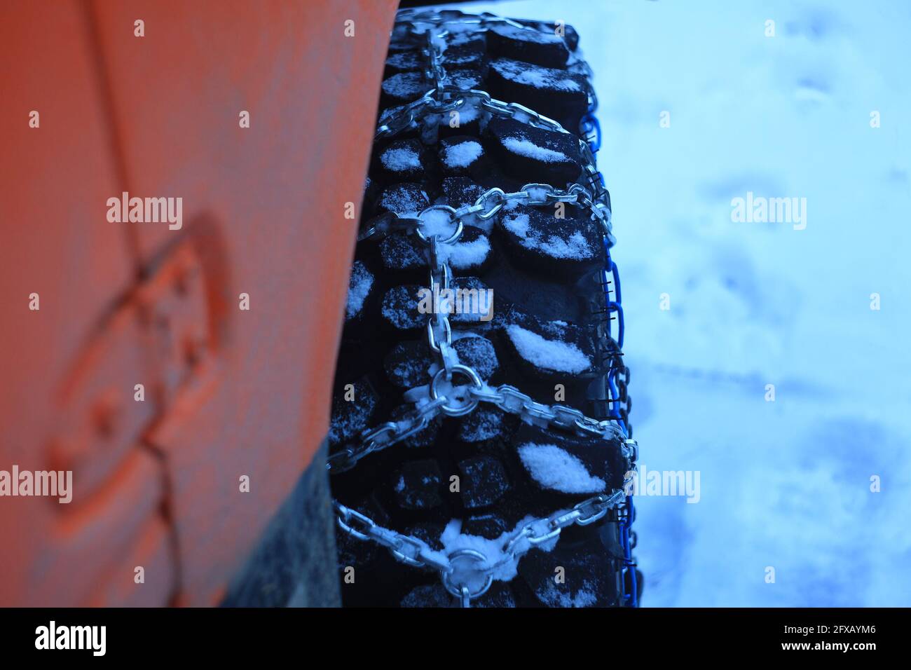 snow chains on off road car tire Stock Photo Alamy