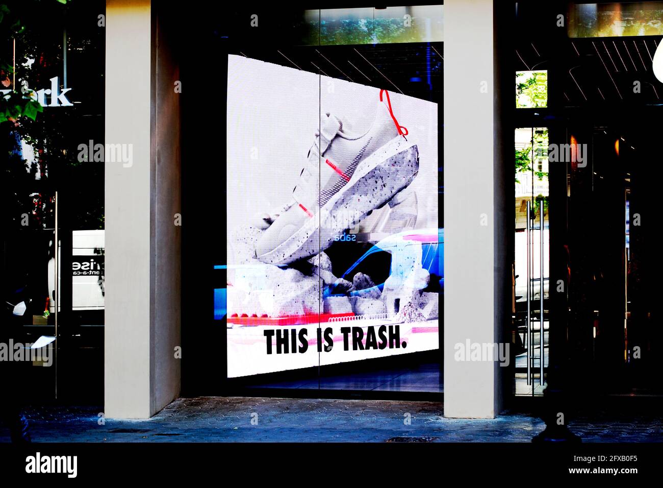 Digital advert - this is trash, Barcelona, Spain. Stock Photo