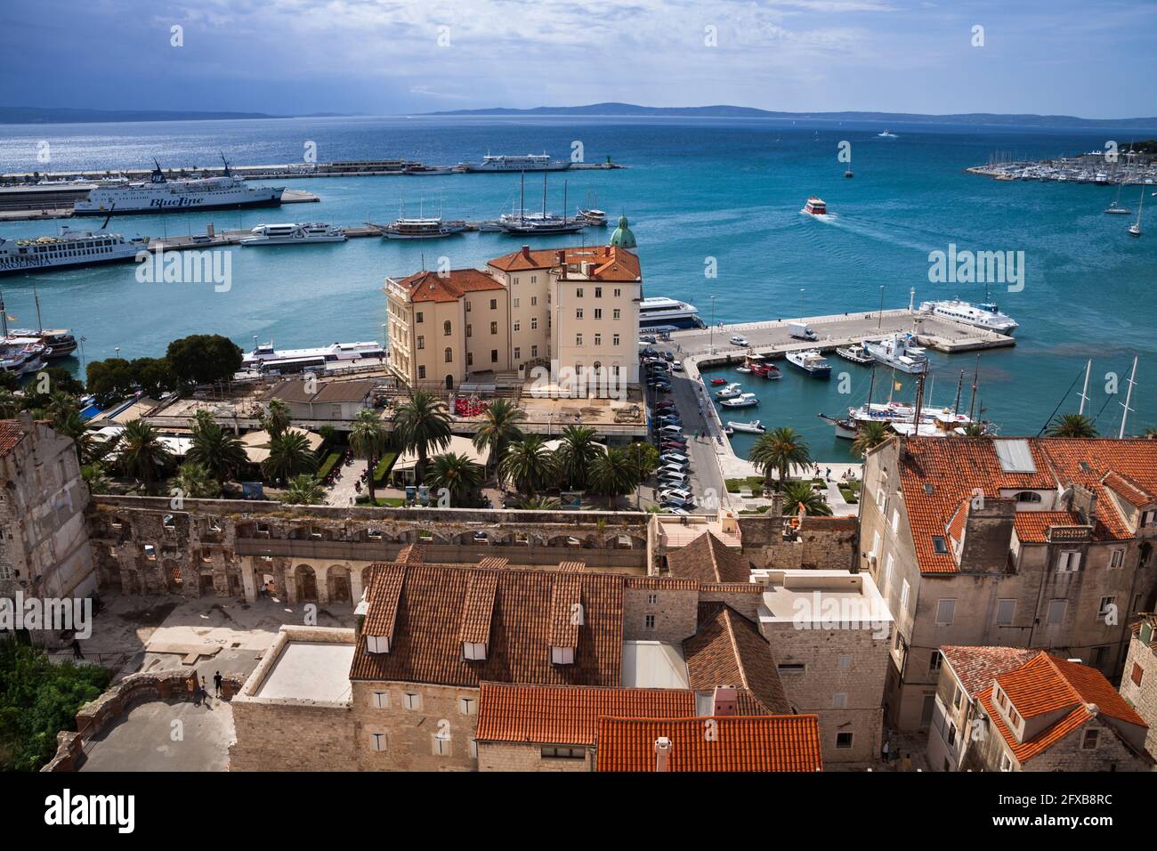 The waterfront of the City of Split as seen from atop the bell tower of the Cathedral of Saint Domnius in the Diocletian Palace in old town. Croatia Stock Photo