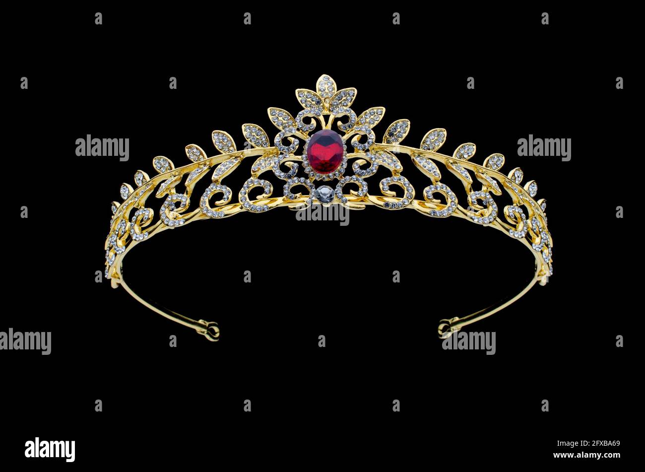 golden crown with rubies on a black background Stock Photo - Alamy