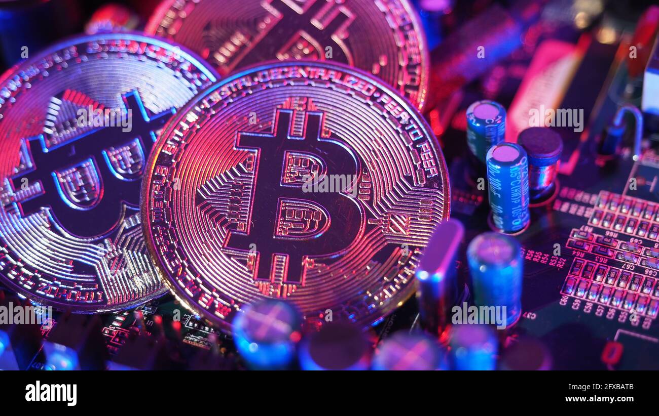 Bitcoin and semiconductor. Represent mining in Cryptocurrency cause global  warming. Bitcoins standing on CPU board. Close-up Bitcoin with blue and pin  Stock Photo - Alamy