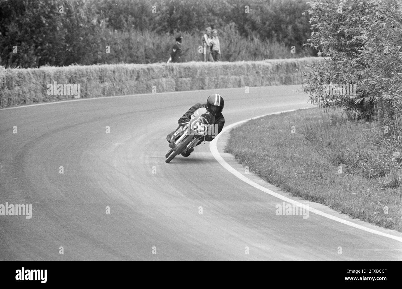 International motorcycle races at Sloten; No. 16 D. van de Wisse (76, 50cc  winner) and P. A. Leek (61) in action, August 4, 1974, MOTORRACES, Winners,  The Netherlands, 20th century press agency