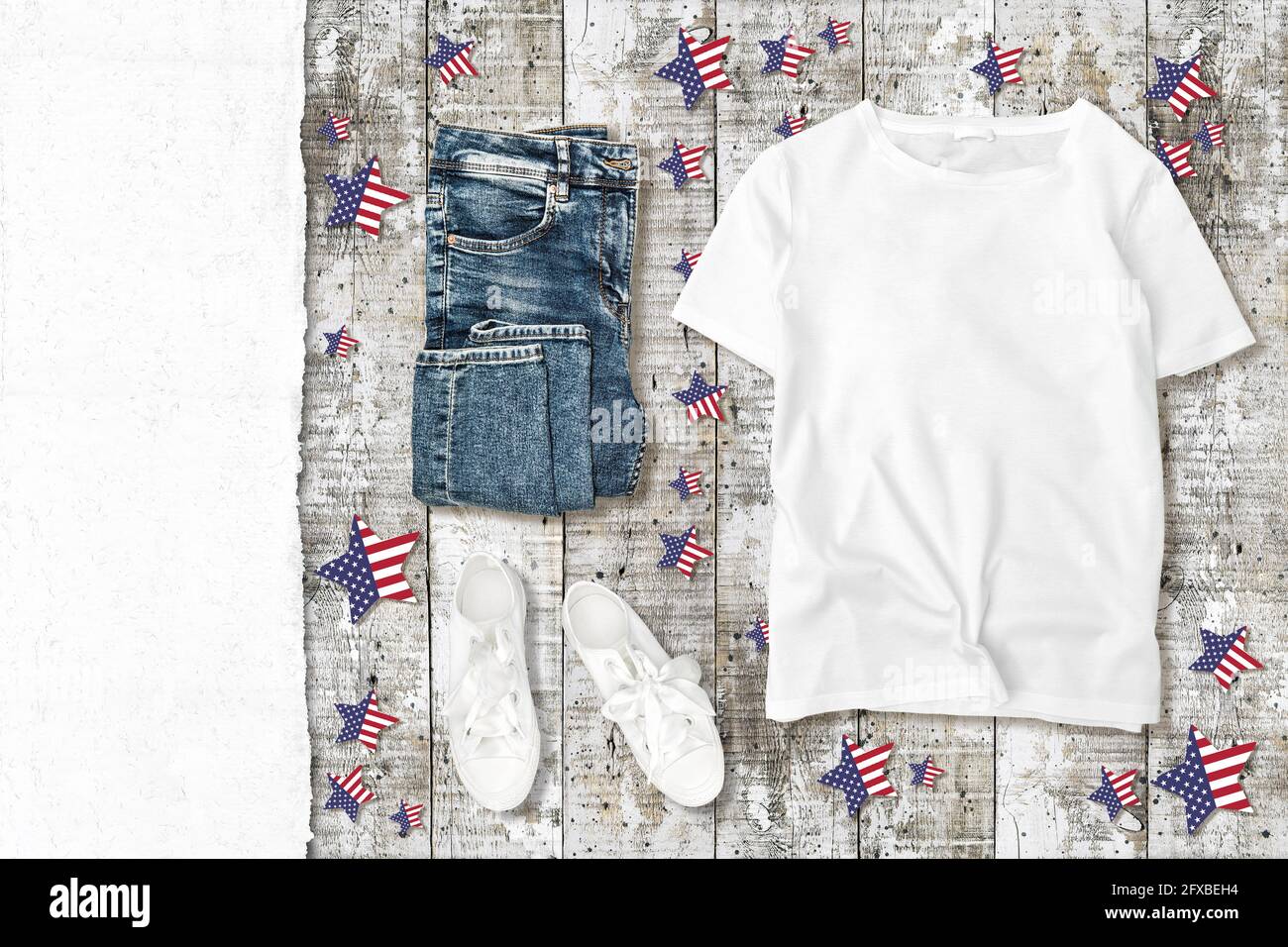 T-shirt mock up template. Fashion flat lay 4th of July patriotic theme decoration Stock Photo