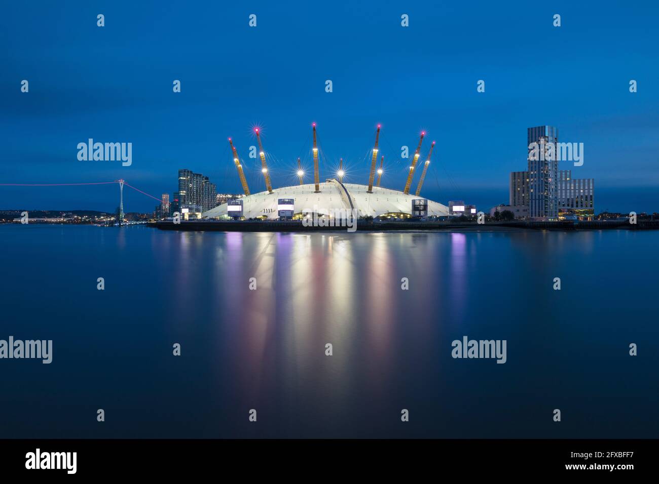 UK, England, London, Long exposure of River Thames and O2 Arena at dusk Stock Photo