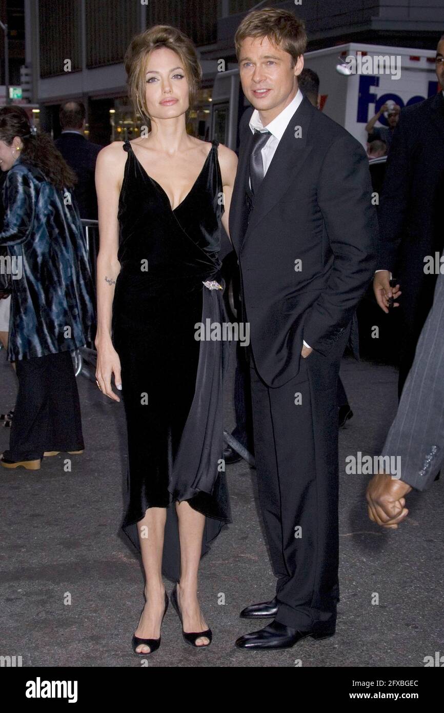 Actress Angelina Jolie and actor/producer Brad Pitt attend the premiere Of 'A Mighty Heart' at the Ziegfeld Theatre on June 13, 2007 in New York. Stock Photo