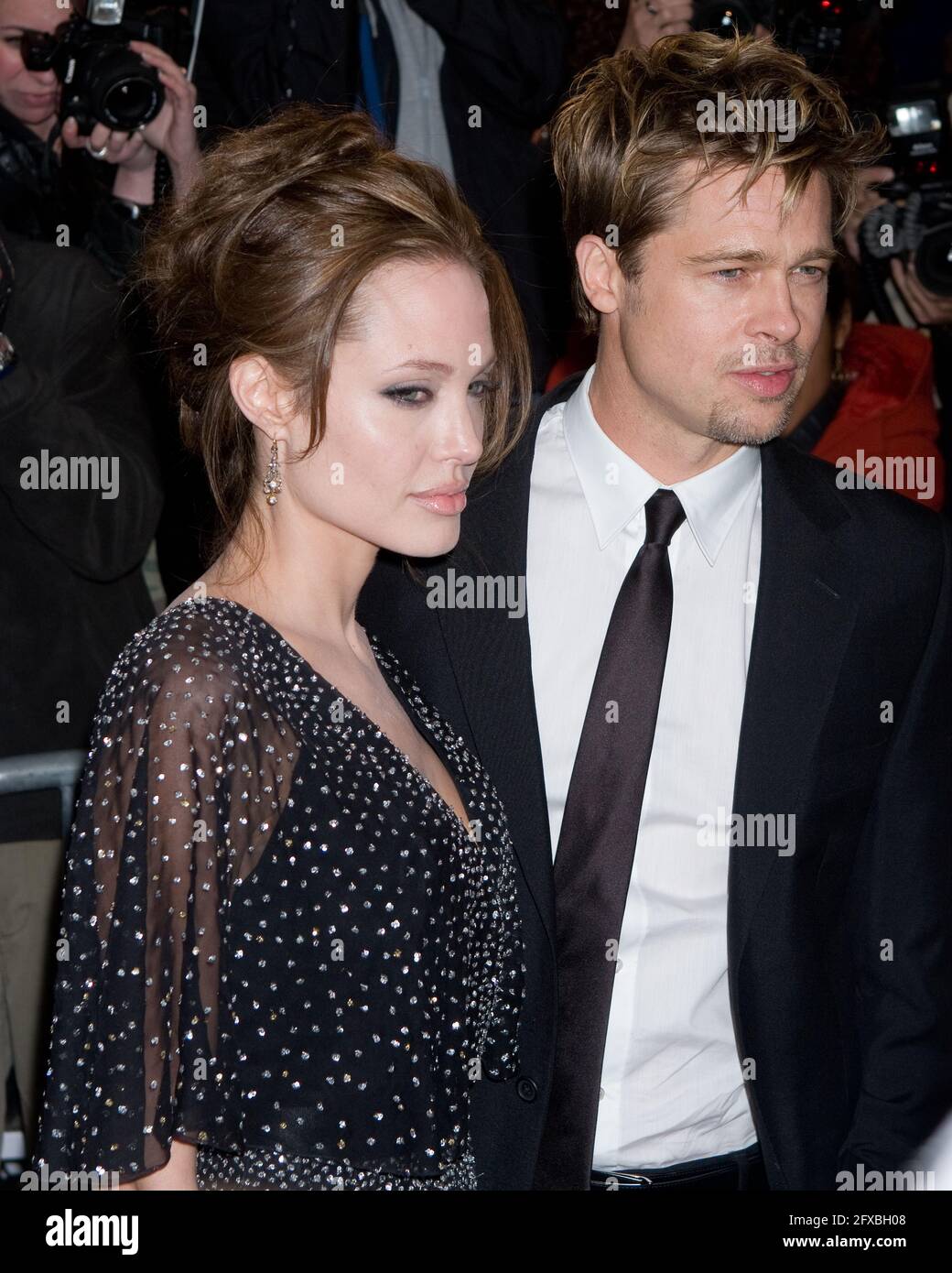 Actress Angelina Jolie and actor Brad Pitt attend the World Premiere of 'The Good Shepherd' presented by Universal Pictures at the Ziegfeld Theatre on Stock Photo