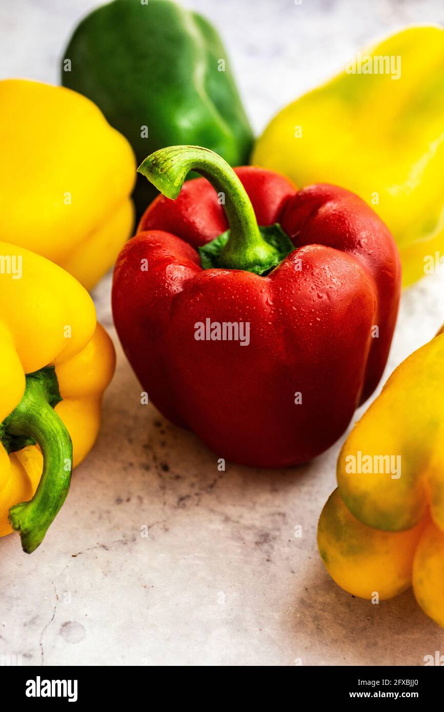 Studio shot of red, green and yellow bell peppers Stock Photo