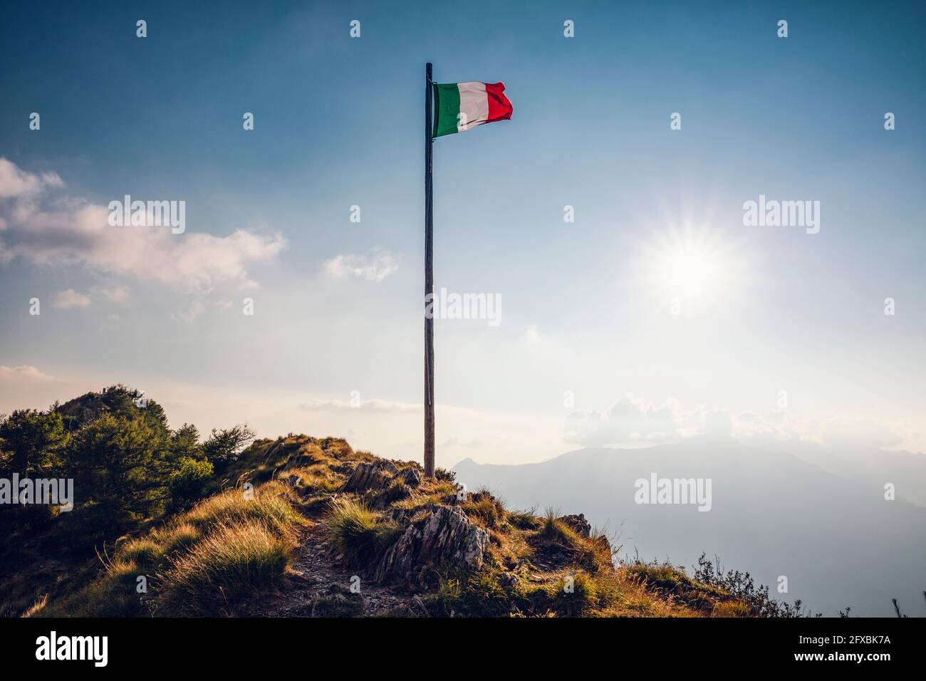 Italy, Lombardy, Italian flag on top of Monte Legnoncino Stock Photo