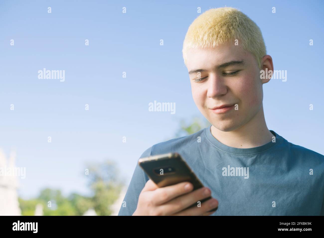Handsome teenager smile outdoor hi-res stock photography and images - Alamy