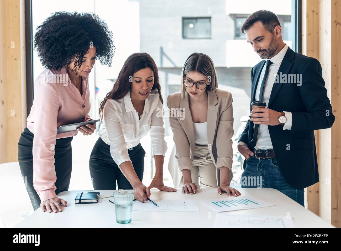 Multi-ethnic male and female business professionals planning in office Stock Photo