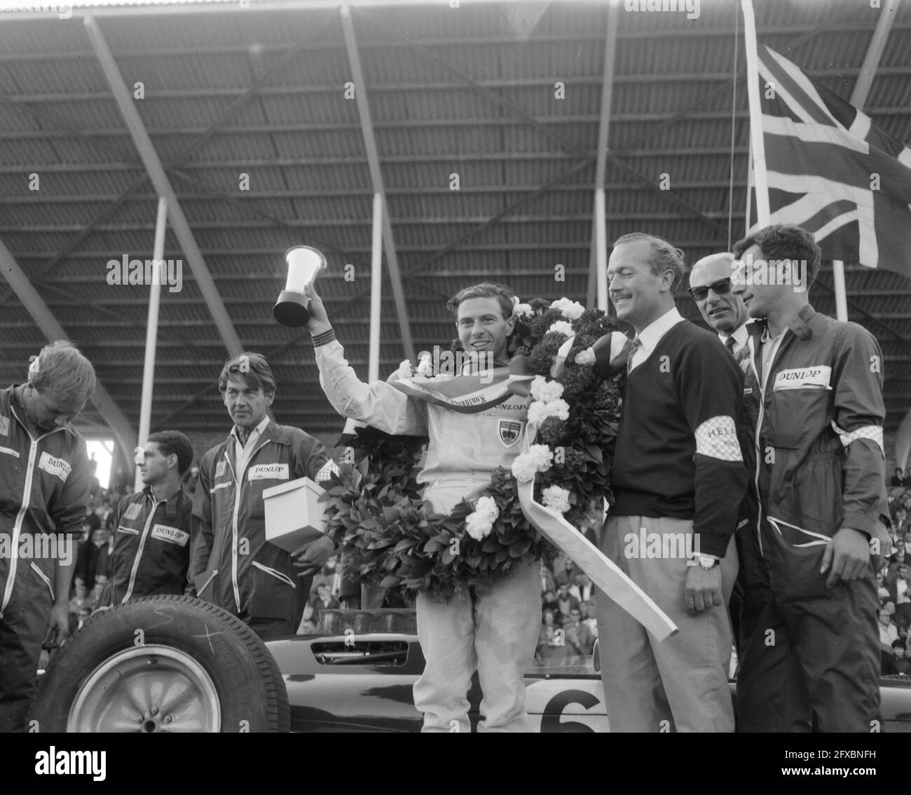 Jim Clark winner Grote Prijs van Nederland in 1963. With wreath and cup. Jim Clark, June 23 1963, Winners, cups, The Netherlands, 20th century press agency photo, news to remember, documentary, historic photography 1945-1990, visual stories, human history of the Twentieth Century, capturing moments in time Stock Photo
