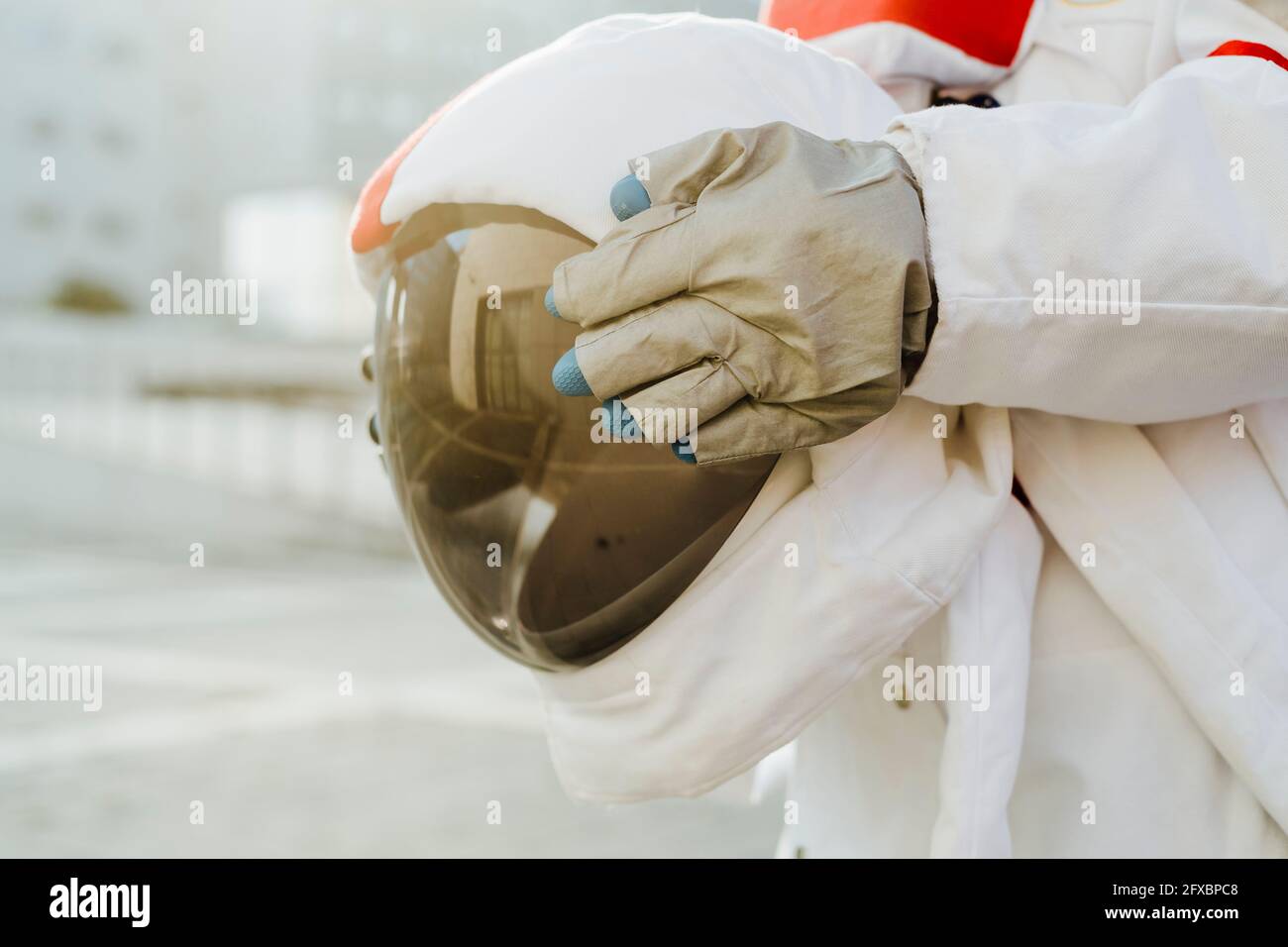Astronaut holding helmet hi-res stock photography and images - Alamy