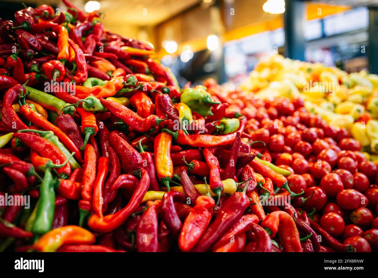 Red chili pepper with vegetables in market Stock Photo - Alamy