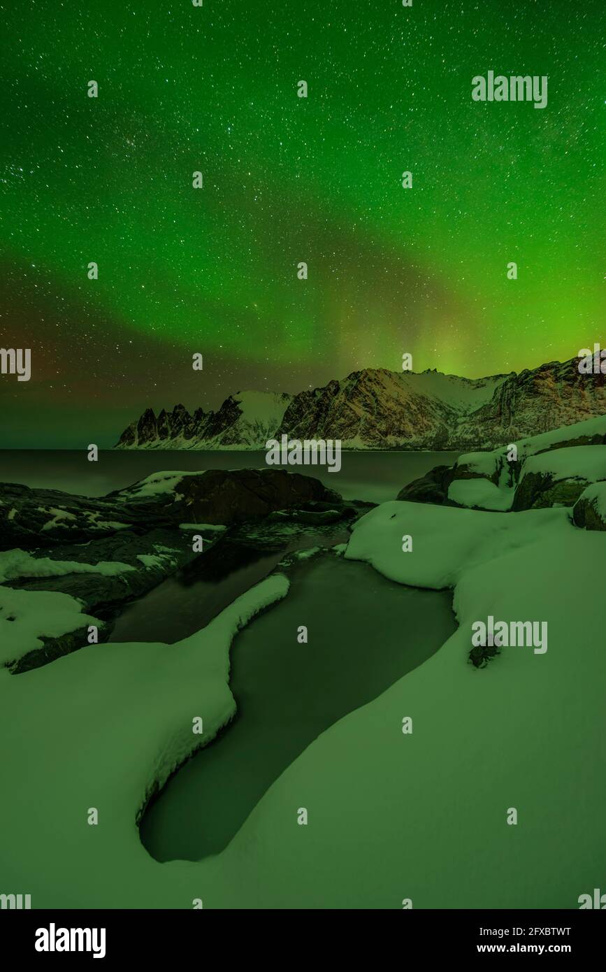 Aurora borealis over tromso hi-res stock photography and images - Alamy