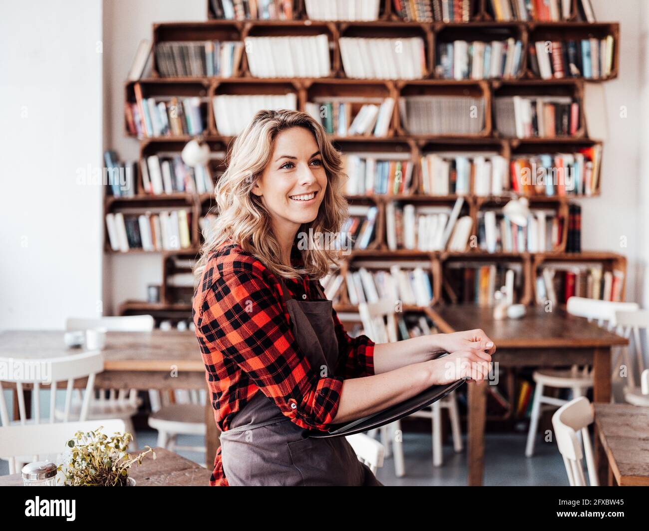 Waitress Reference Cafe serving table hi-res stock photography and images - Alamy
