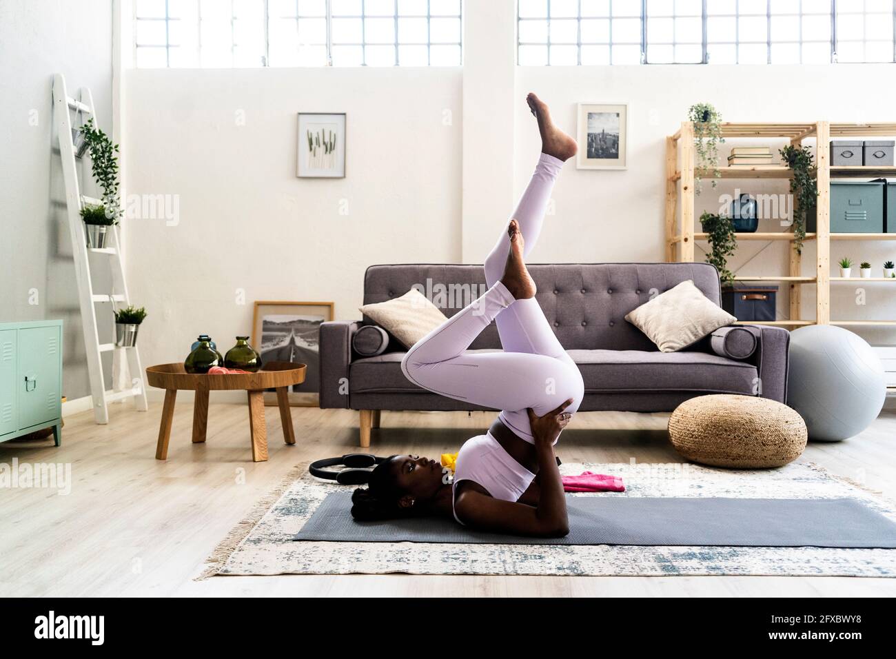Woman upside down on couch one person hi-res stock photography and ...
