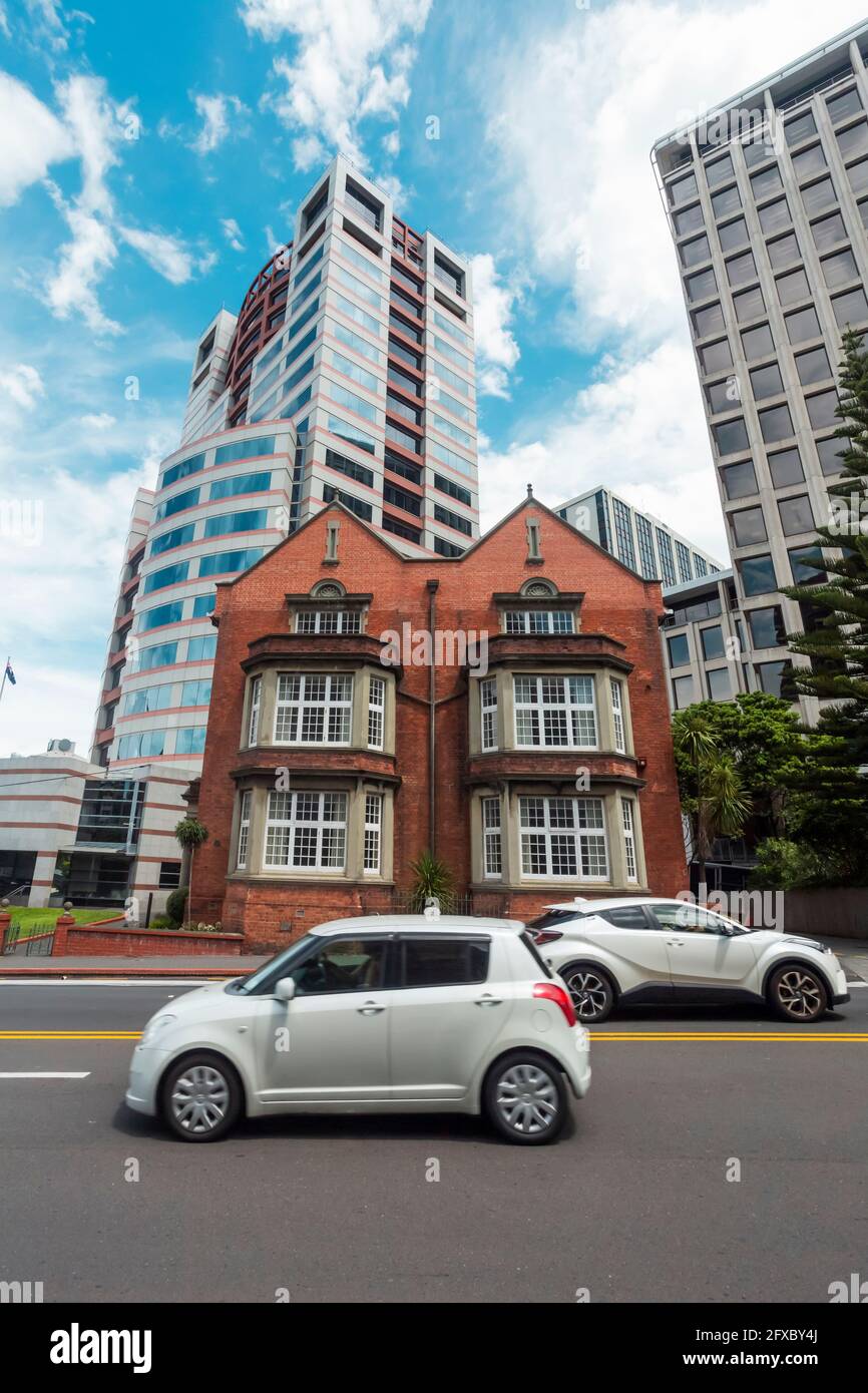 New Zealand, Wellington Region, Wellington, Cars passing roadside house