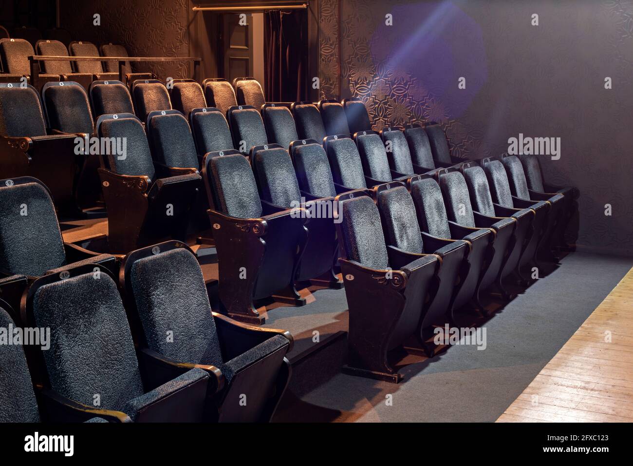 Seats in empty theater Stock Photo