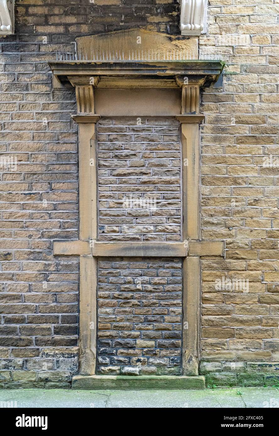 Bricked up stone doorway Stock Photo