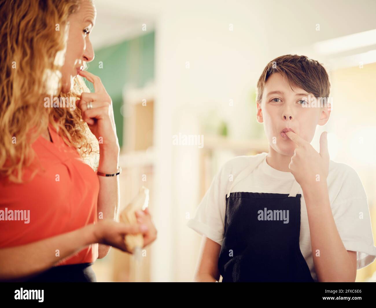 Son licking it hi-res stock photography and images - Alamy