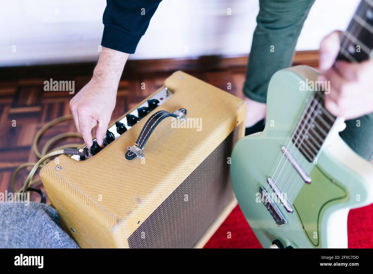 Male music composer with equipment in studio Stock Photo