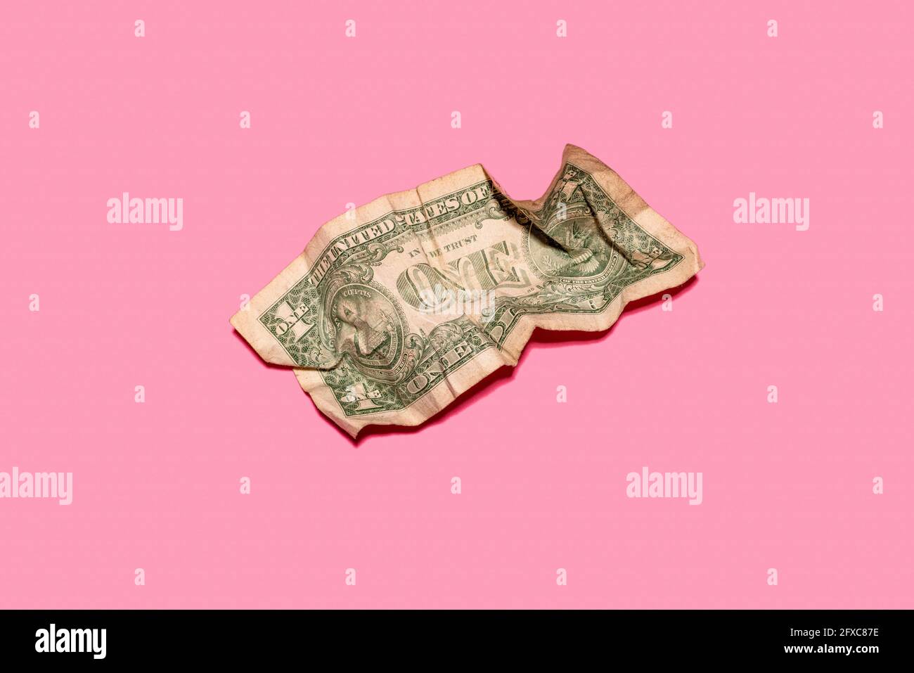 Studio shot of single crumpled one dollar bill Stock Photo