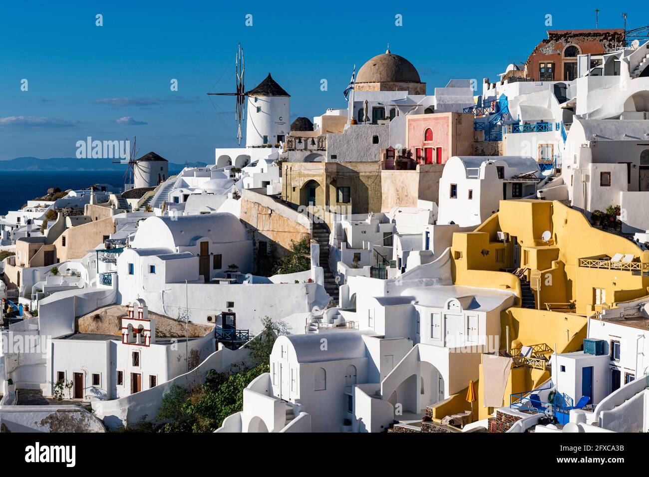 Greece, Santorini, Oia, High angle view of villages whitewashed architecture with windmills Stock Photo