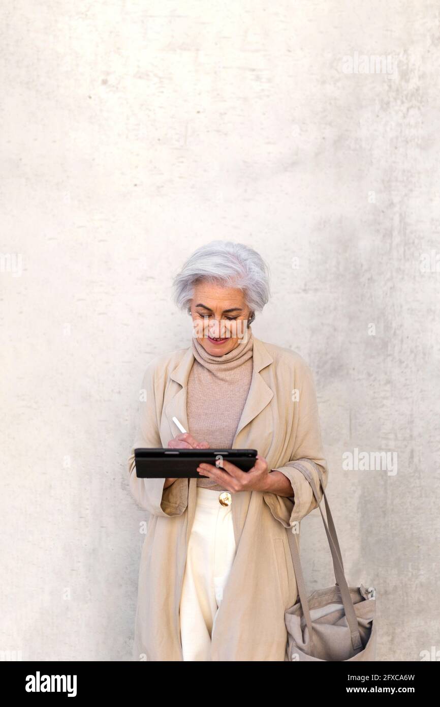 Mature woman outdoors pen hi-res stock photography and images - Alamy