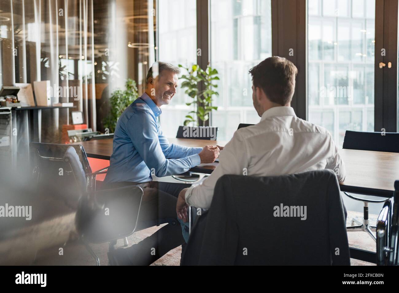 Two men in meeting room hi-res stock photography and images - Alamy