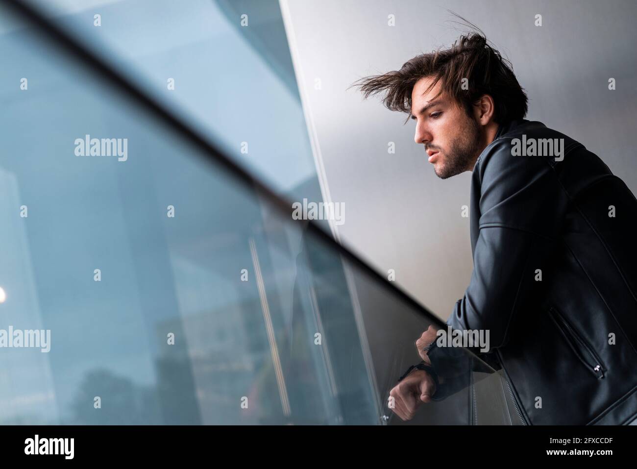 Handsome young man wearing black leather jacket Stock Photo