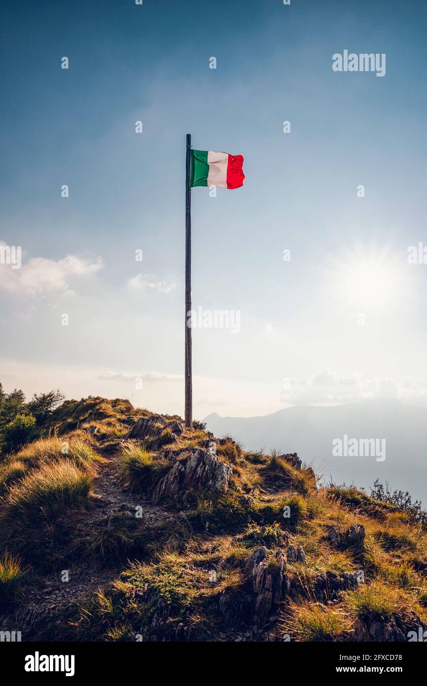 Italy, Lombardy, Italian flag on top of Monte Legnoncino Stock Photo ...