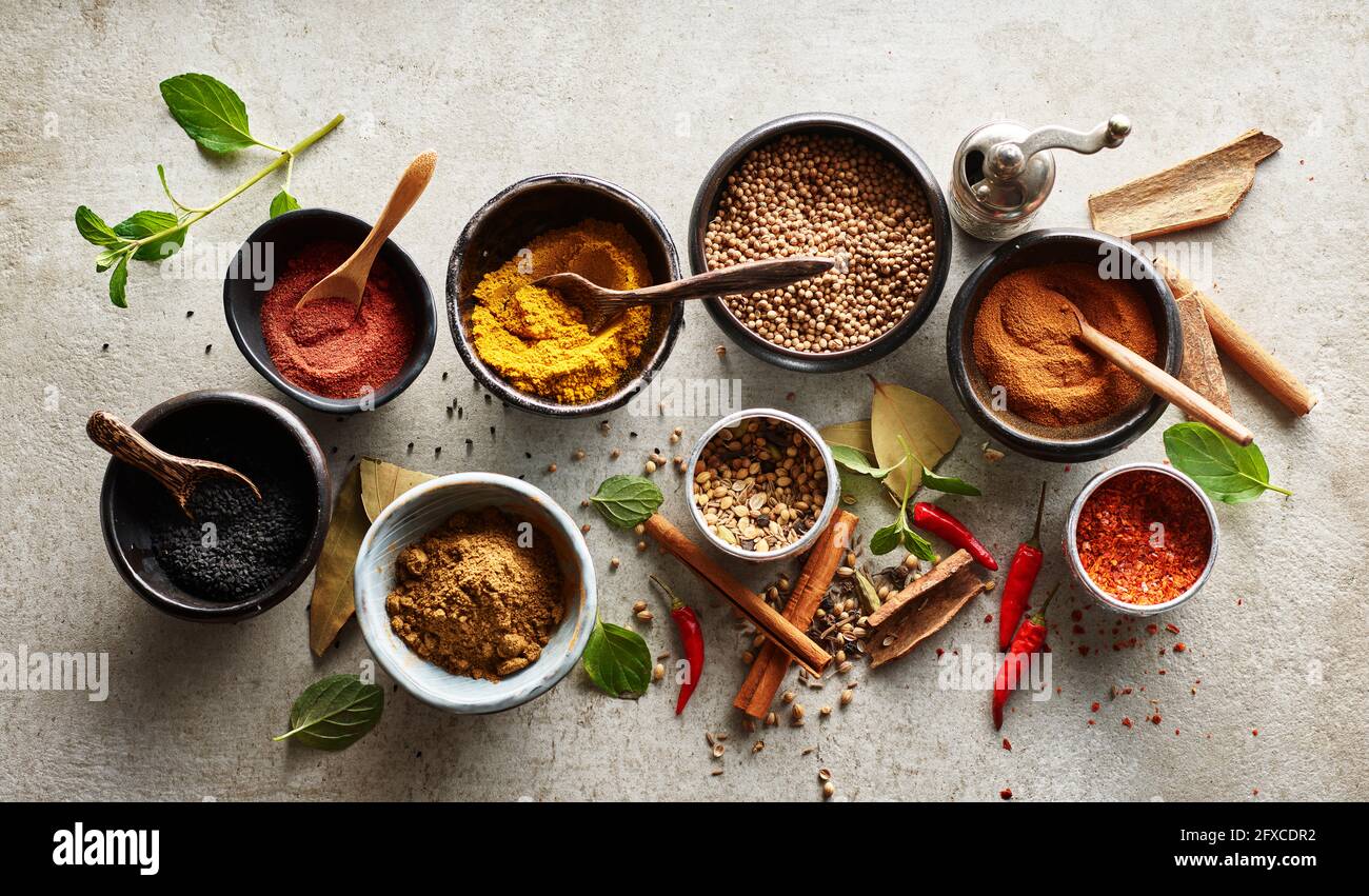 Studio shot of bowls with various Asian spices Stock Photo