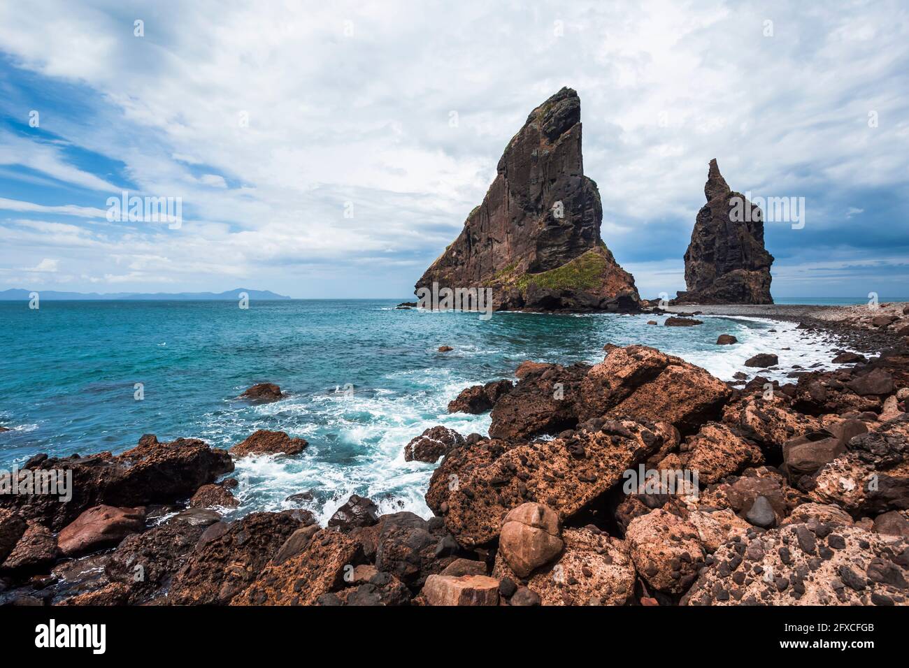 Tall rock formations off coast ofÂ CoromandelÂ Peninsula Stock Photo
