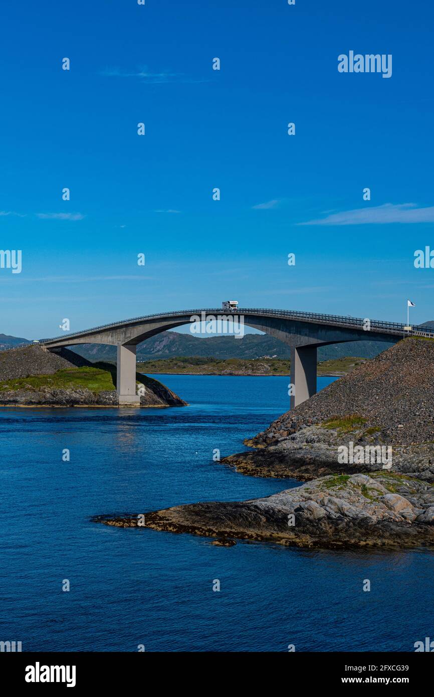 Norway, More og Romsdal, Blue sky over bridge on Atlantic Ocean Road Stock Photo