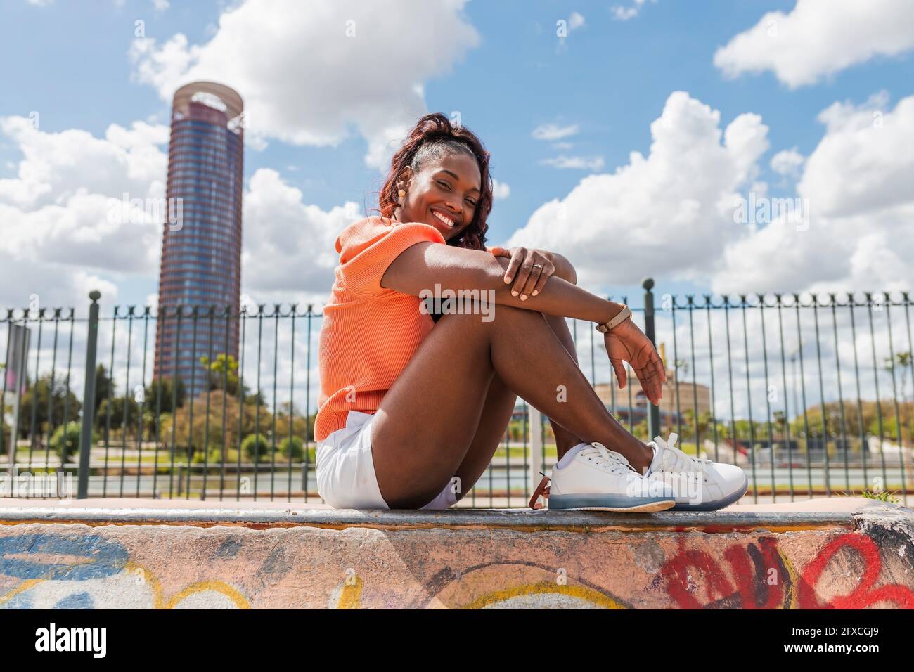 African woman side view sitting hi-res stock photography and images - Alamy