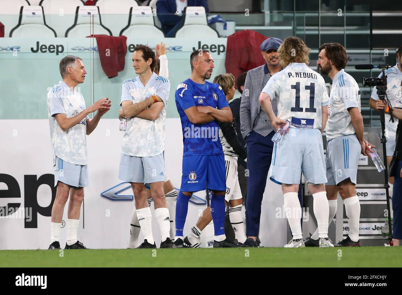 Turin, Italy, 25th May 2021. Carlos Tavares CEO of Stellantis discusses with John Elkan CEO of Exor as Franck Ribery, Sinisa Mihajlovic, Pavel Nedved Vice President of Juventus and Andrea Pirlo Head coach of Juventus chat during the Charity Match match at Allianz Stadium, Turin. Picture credit should read: Jonathan Moscrop / Sportimage Stock Photo