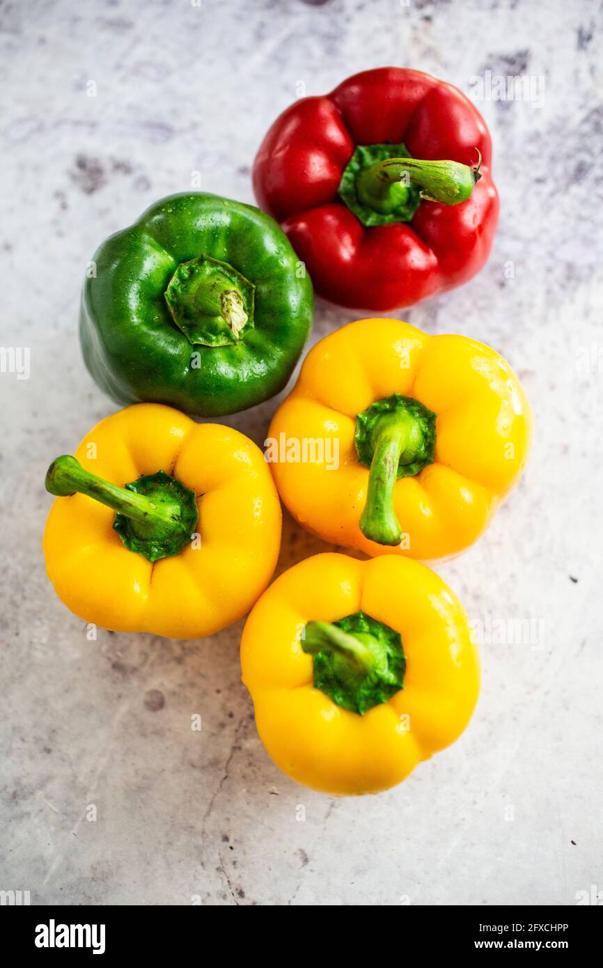 Studio shot of red, green and yellow bell peppers Stock Photo
