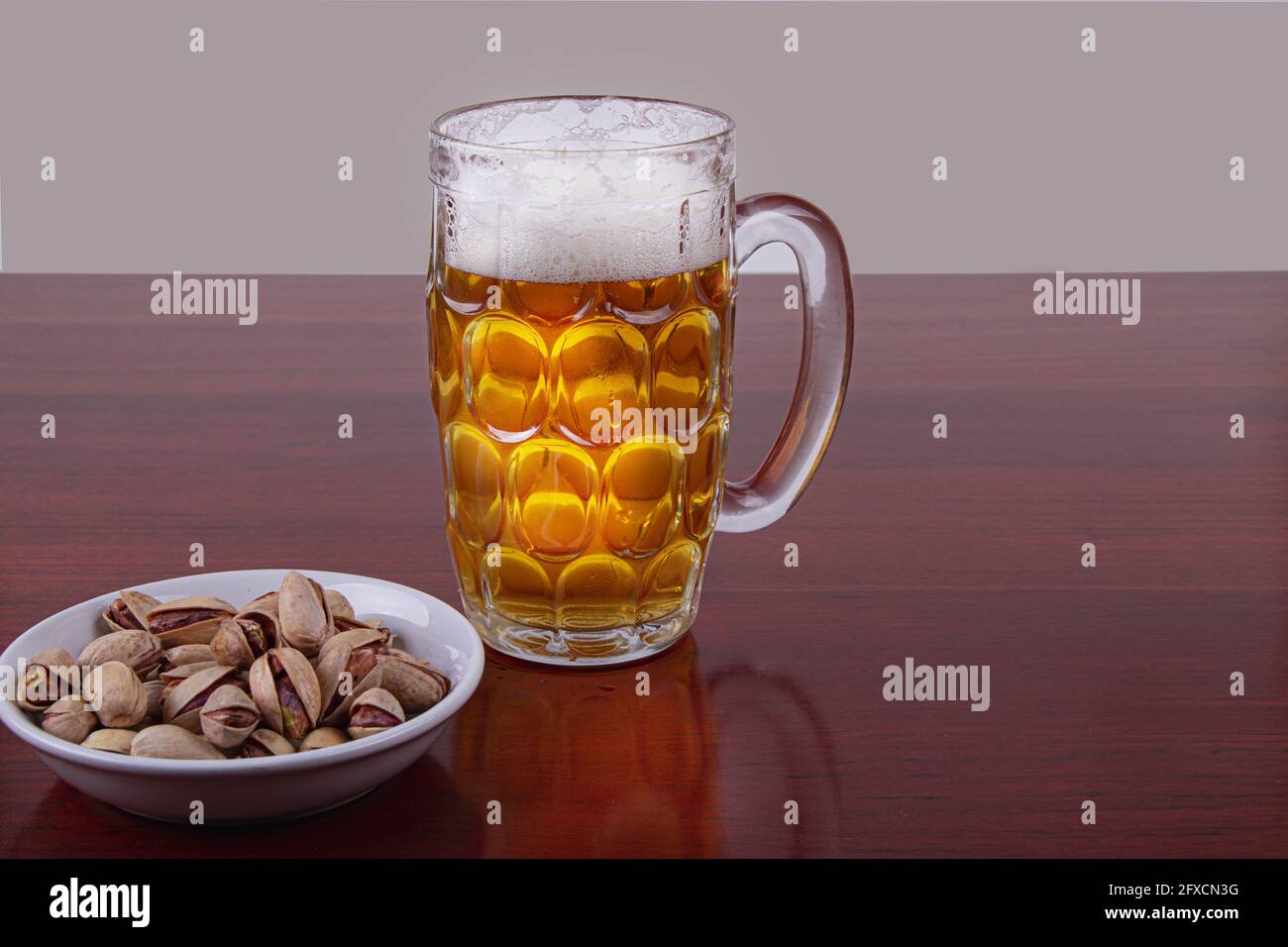 Beer with nuts Stock Photo Alamy