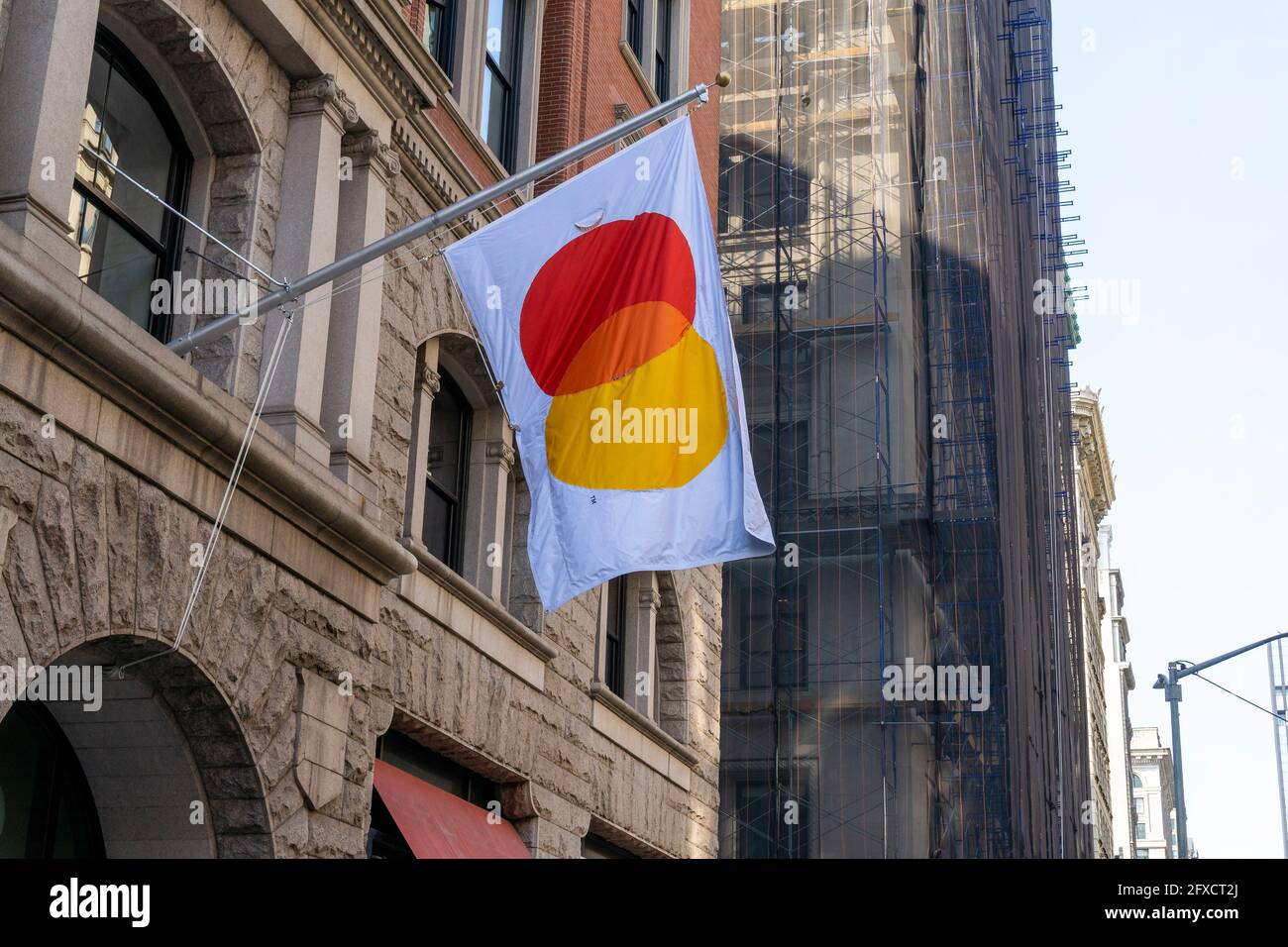 A flag branding the MasterCard Tech Hub in the Flatiron neighborhood of New  York on Wednesday, May 19, 2021. MasterCard announced that it will be  bringing back workers to its New York, image size:1300x956