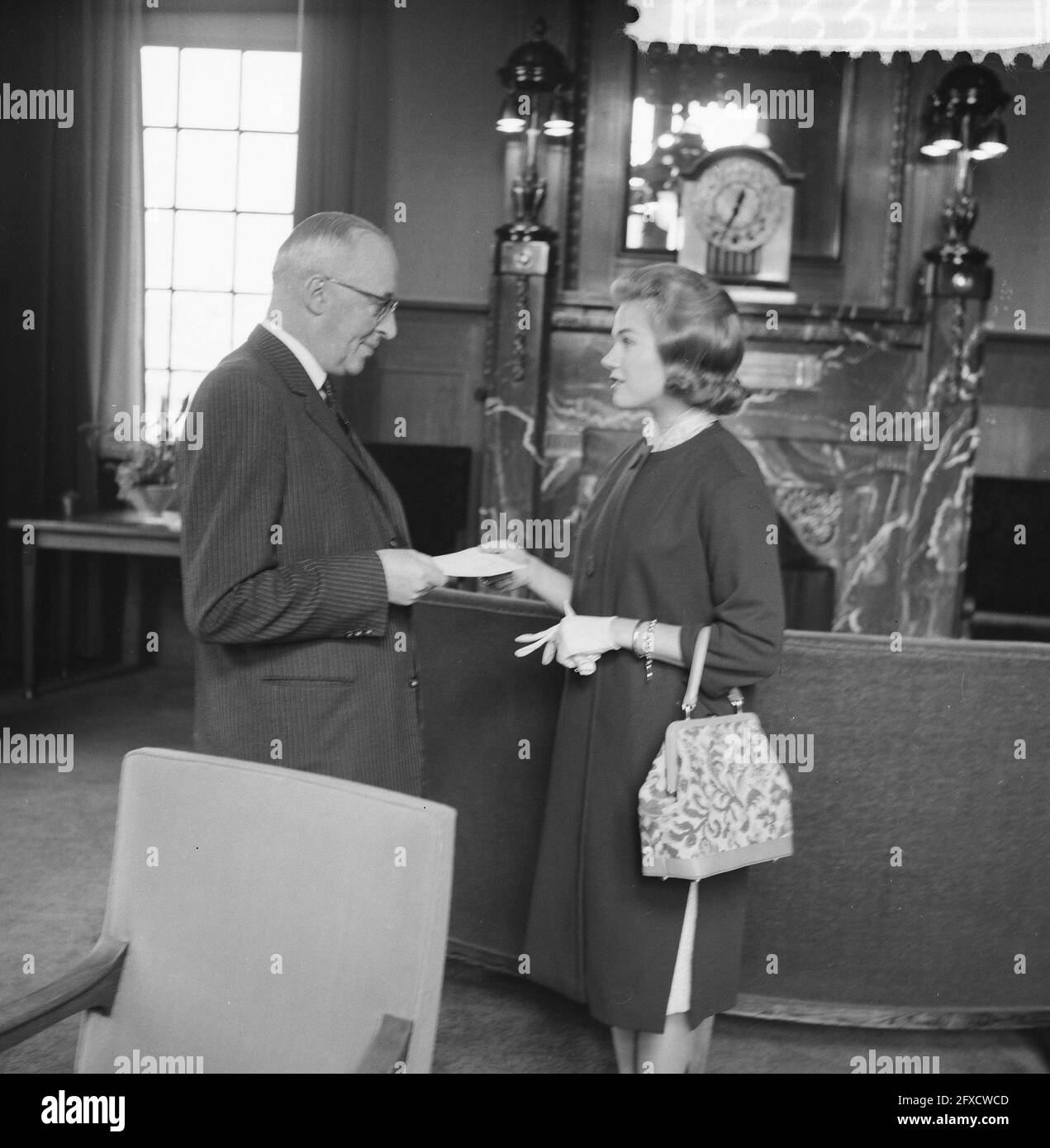 Peggy Jacobsen hands Mayor van Hall letter, April 11, 1961, letters,  handing over, The Netherlands, 20th century press agency photo, news to  remember, documentary, historic photography 1945-1990, visual stories,  human history of