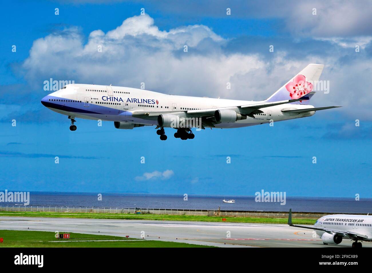 China Airlines Boeing B-747-400, B-18210, Landing at Naha Airport, Okinawa, Japan Stock Photo