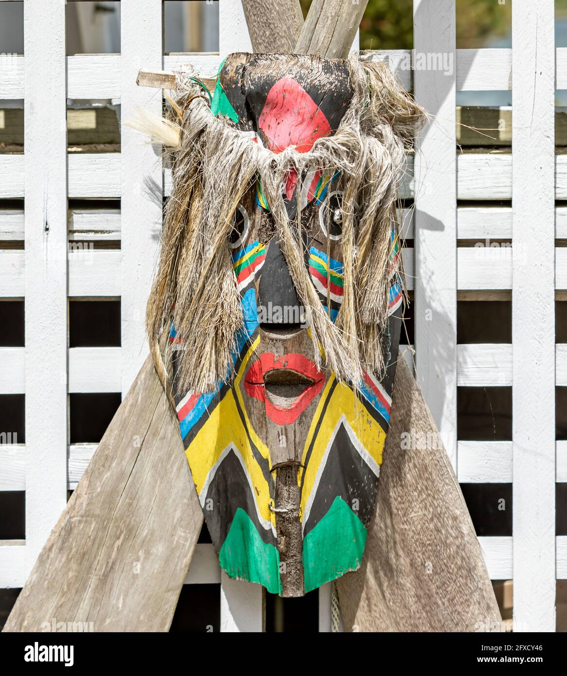 mask made of found objects and oars Stock Photo