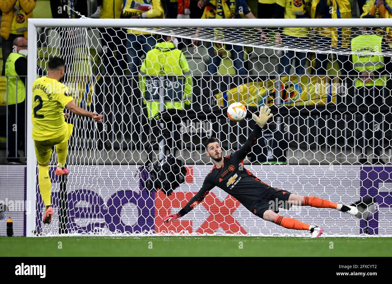 Manchester United goalkeeper David de Gea fails to save Villarreal's Gaspar Mario's penalty during the UEFA Europa League final, at Gdansk Stadium, Poland. Picture date: Wednesday May 26, 2021. Stock Photo