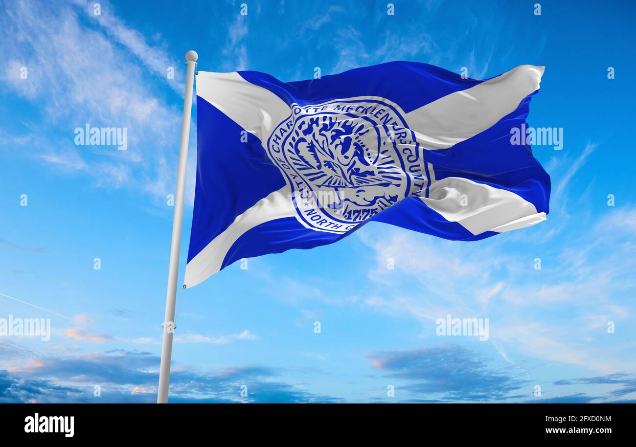 flag of Boston at cloudy sky background on sunset, panoramic view