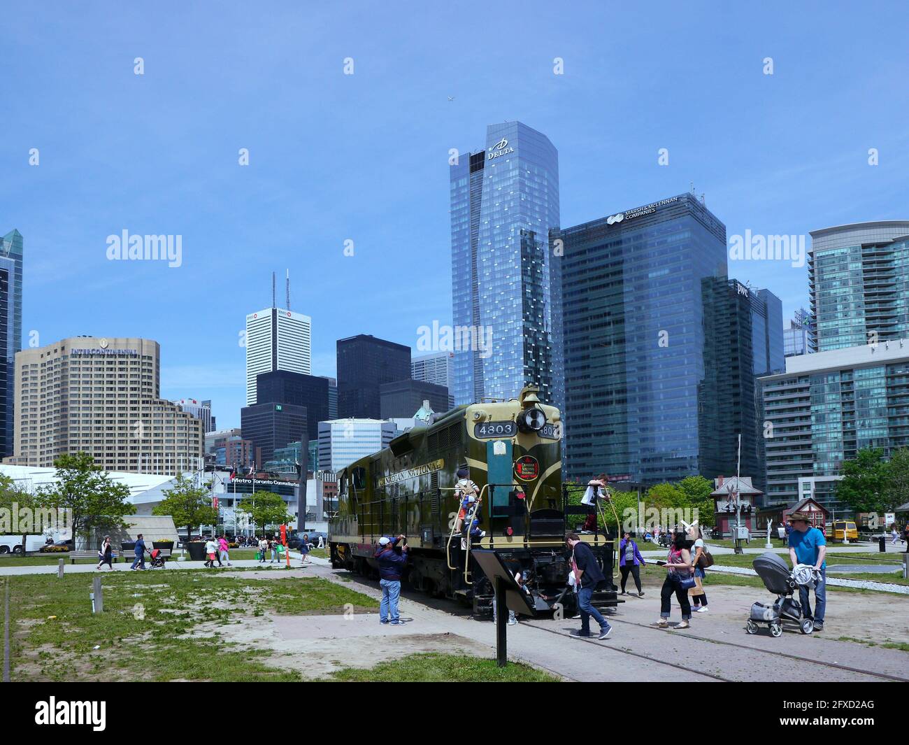 Toronto, Canada - May 28, 2017:  An outdoor display of historic locomotives in downtown Toronto is a popular attraction for children Stock Photo