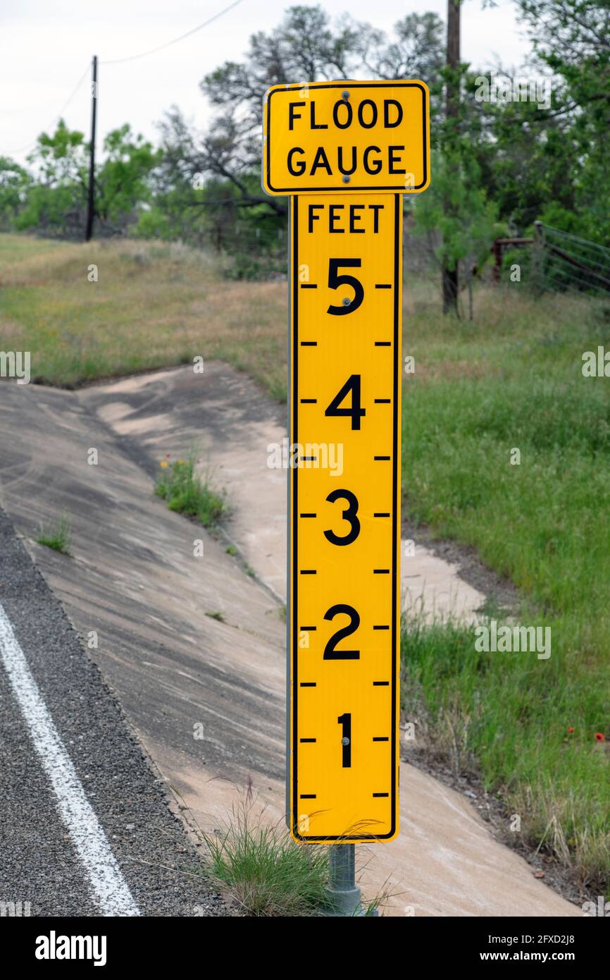 Flood gauge, along rural Texas road, near Fredericksburg, TX, USA, by James D Coppinger